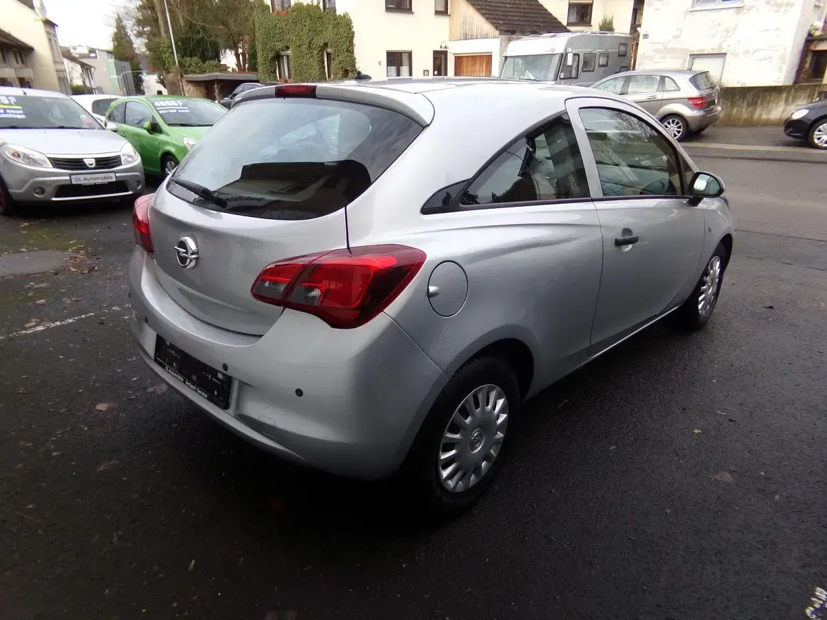 Używany Opel Corsa Selection 69 KM (50 kW) 2016 Srebrny Sedan/Limuzyna