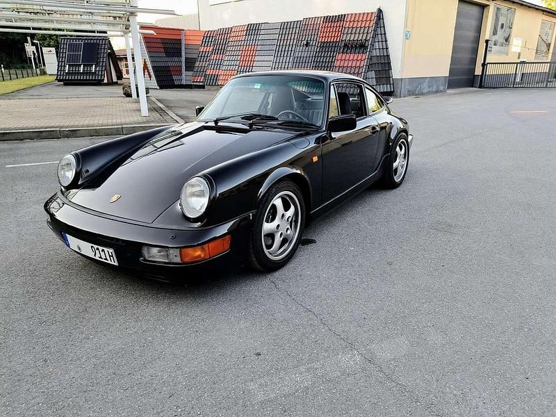 Schwarz Gebraucht 1990 Porsche 911 Carrera 4 Coupé | 120.000 € - Bild 1/4