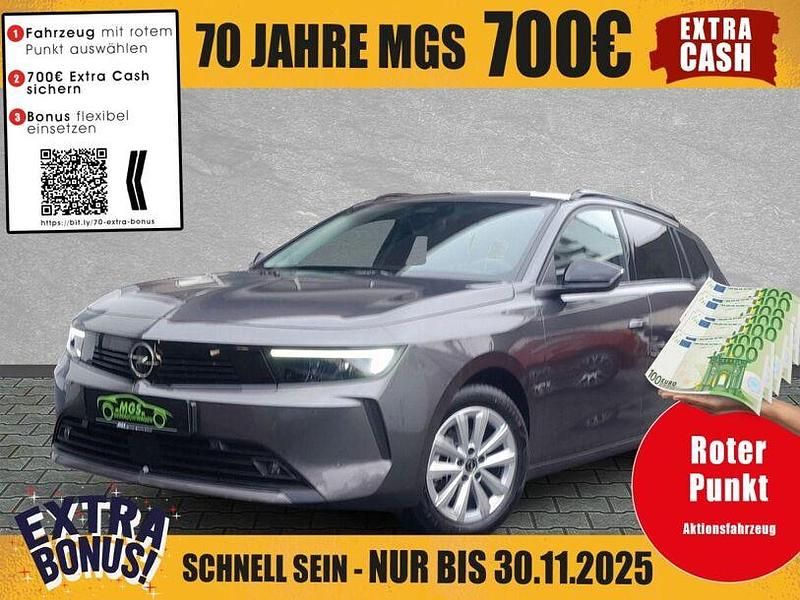 Vulkan grau metallic Gebraucht 2024 Opel Astra Enjoy Kombi | 21.370 € (Guter Preis) - Bild 1/4