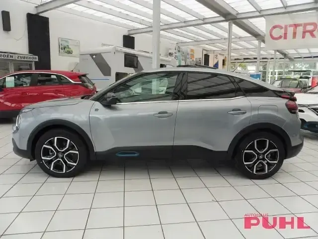 Gebraucht Citroën e-C4 Shine 100 kW (136 PS) 2023 Grau Limousine