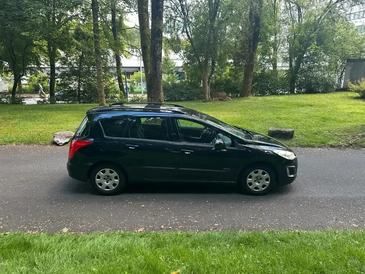 Gebraucht Peugeot 308 SW Access 116 PS (85 kW) 2011 Schwarz Kombi