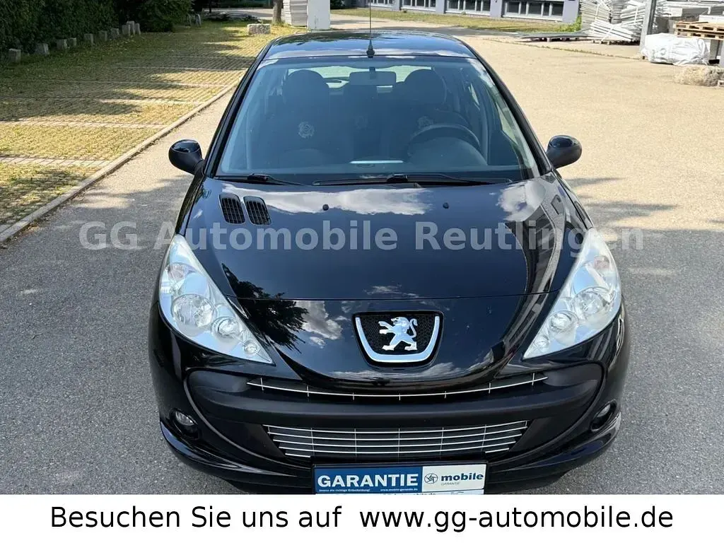 Gebraucht Peugeot 206 73 PS (53 kW) 2012 Schwarz Limousine