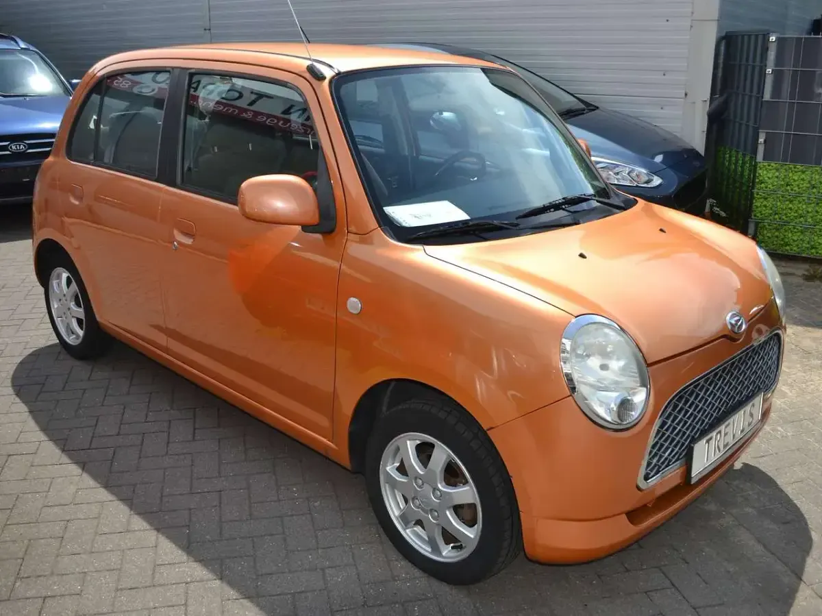 Gebraucht Daihatsu Trevis 58 PS (42 kW) 2006 Papaya perleffekt r44 Kleinwagen