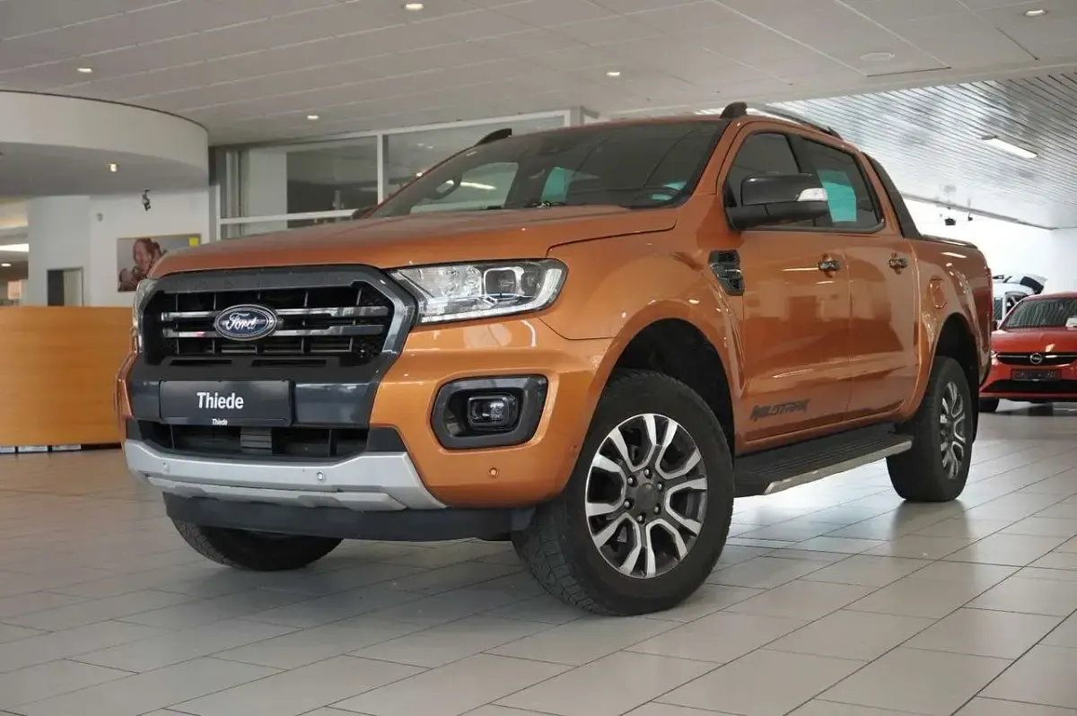 Gebraucht Ford Ranger Wildtrack 212 PS (155 kW) 2023 Orange metallic Pickup