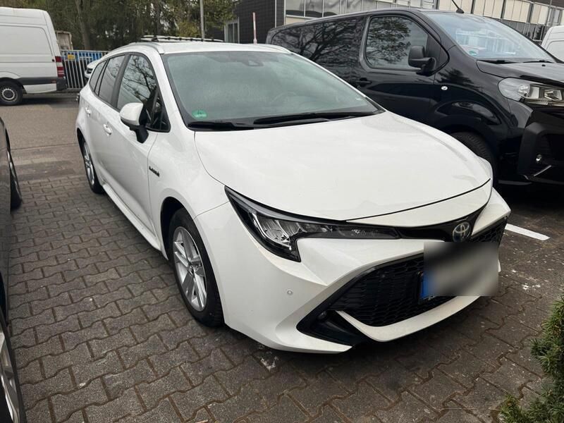 Weiß Gebraucht 2019 Toyota Corolla Hybrid Kombi | 14.200 € - Bild 1/4