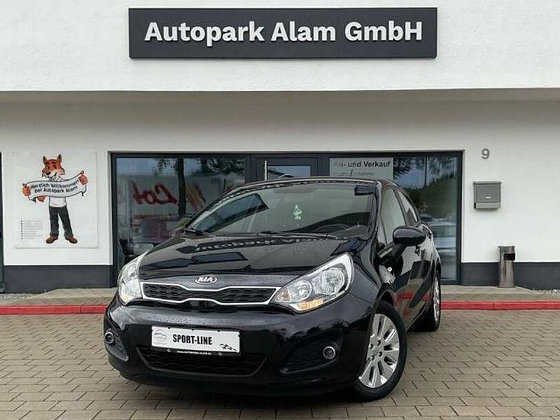 Schwarz Gebraucht 2014 Kia Rio DREAM-TEAM Edition Kleinwagen | 6.999 € (Fairer Preis) - Bild 1/4