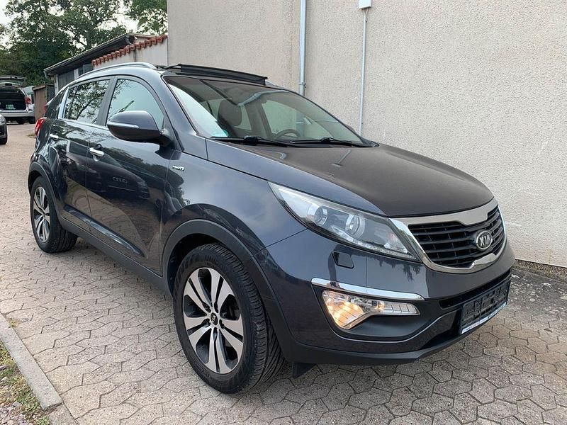 Grau Gebraucht 2012 Kia Sportage Spirit SUV | 9.600 € (Fairer Preis) - Bild 1/4
