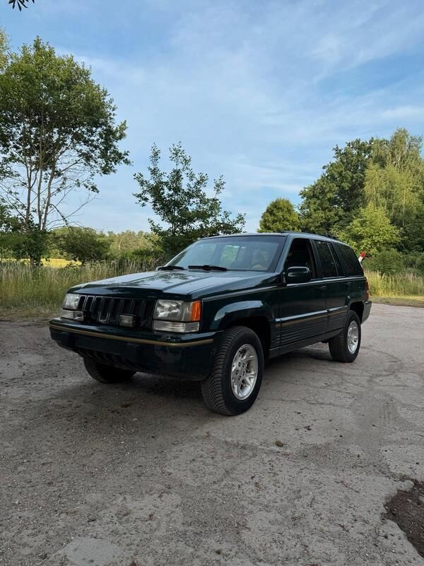 Grün Gebraucht 1993 Jeep Grand Cherokee SUV | 10.800 € - Bild 1/4