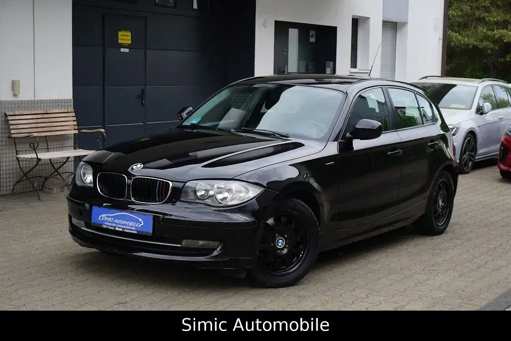 Second-hand BMW 116 122 CP (89 kW) 2011 Negru Hatchback
