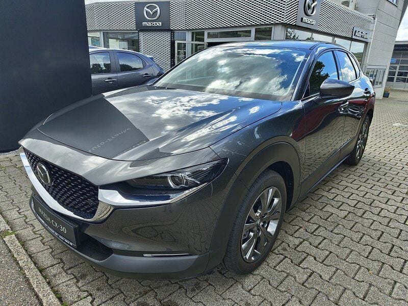 Machine gray Neu 2025 Mazda CX-30 Exclusive-Line SUV | 34.090 € - Bild 1/4