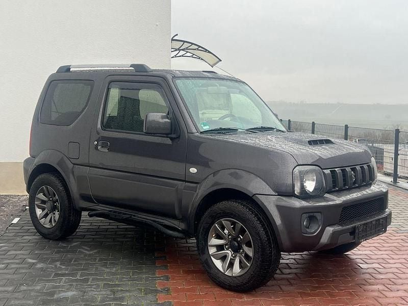 Grau Gebraucht 2016 Suzuki Jimny Style SUV | 16.900 € (Etwas zu teuer) - Bild 1/4