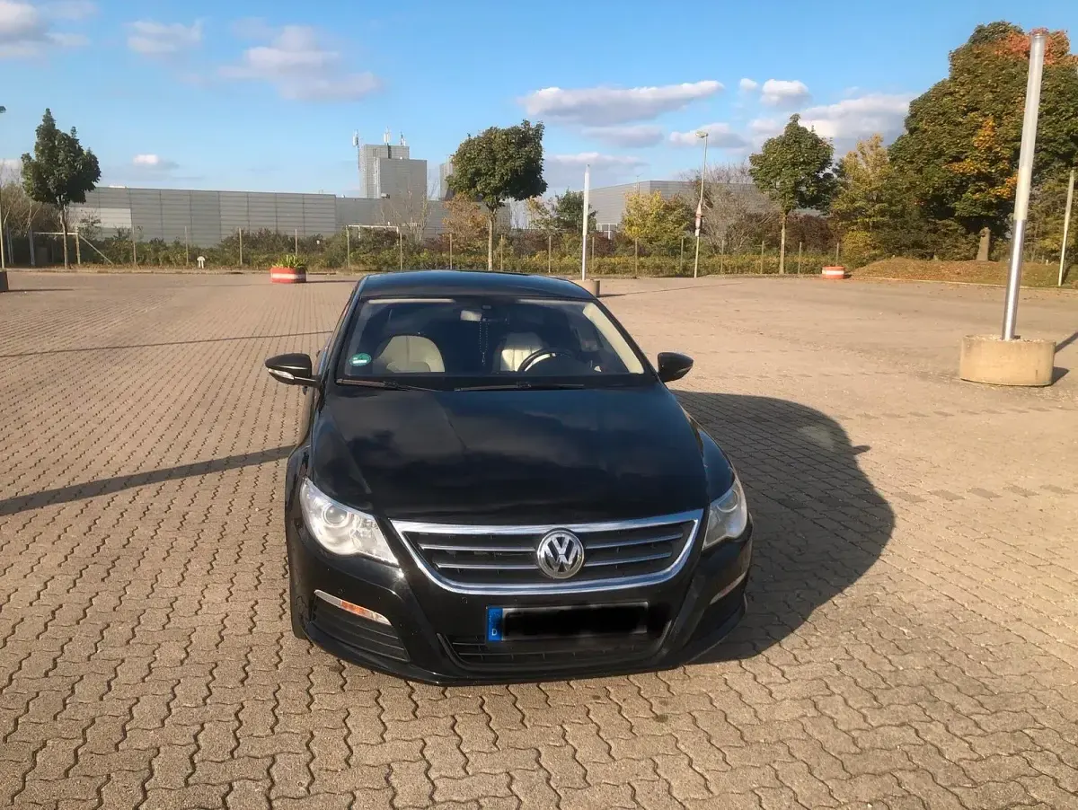 Second-hand VW Passat 160 CP (117 kW) 2010 Negru Berlinǎ