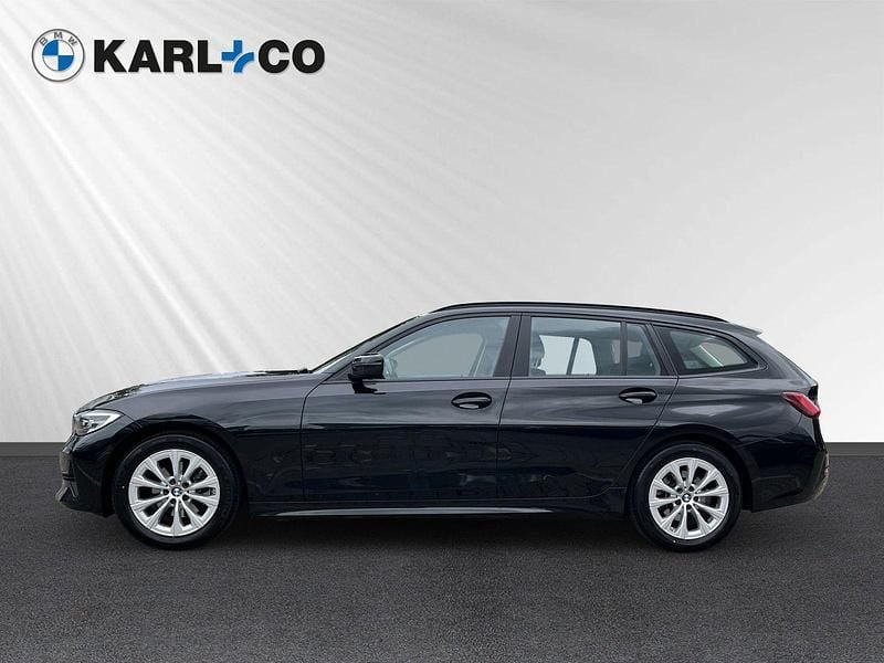 Schwarz Gebraucht 2022 BMW 320 Advantage Kombi | 24.478 € (Superpreis) - Bild 1/4
