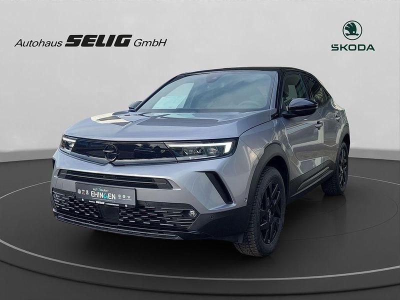 Gebraucht Opel Mokka 131 PS (96 kW) 2025 Silbermetallic SUV