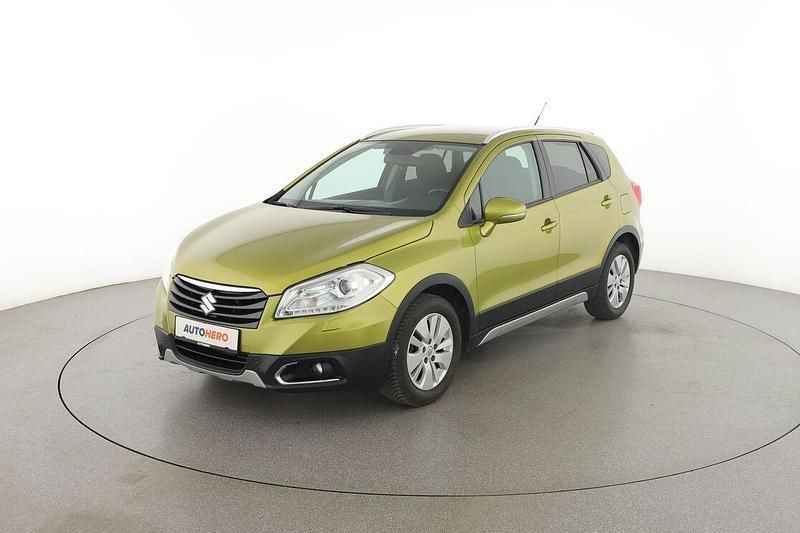 Grün Gebraucht 2014 Suzuki SX4 Comfort+ SUV | 11.820 € - Bild 1/3