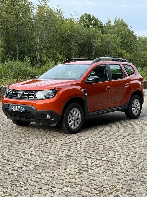 Orange Gebraucht 2021 Dacia Duster Comfort SUV | 13.990 € (Fairer Preis) - Bild 1/2