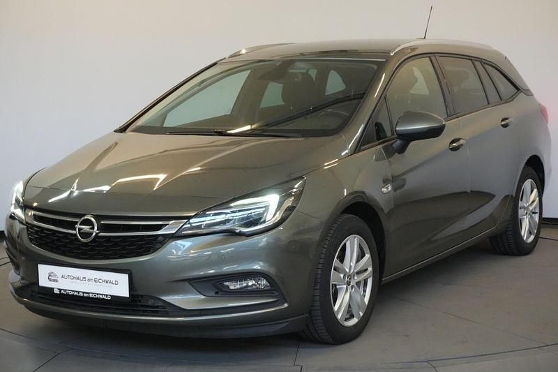 Grau Gebraucht 2016 Opel Astra Active Limousine | 9.190 € (Fairer Preis) - Bild 1/4