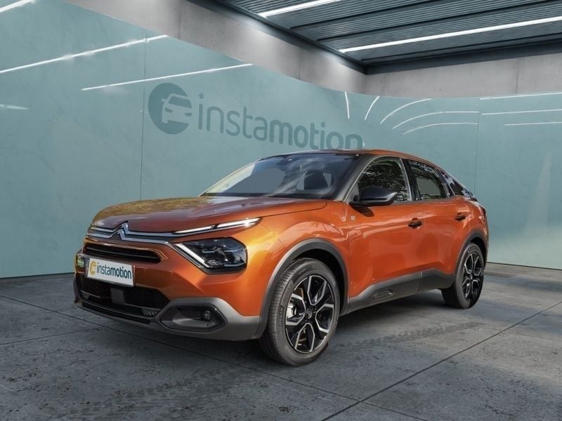 Second-hand Citroën e-C4 Feel 100 kW (136 CP) 2022 Portocaliu Berlinǎ