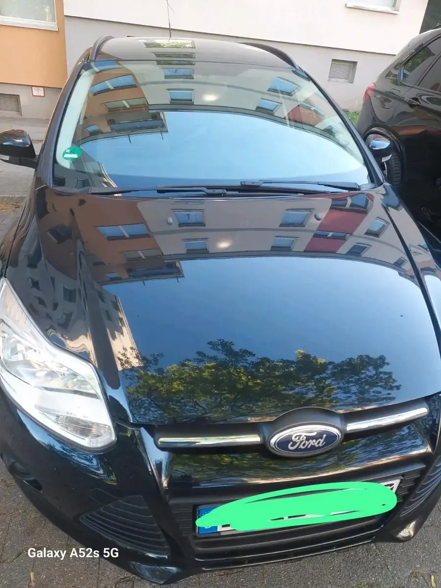 Używany Ford Focus 125 KM (91 kW) 2014 Czarny Kombi