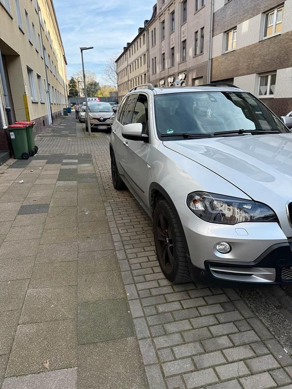 Second-hand BMW X5 231 CP (169 kW) 2009 Argintiu SUV