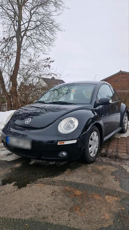 Gebraucht VW New Beetle 75 PS (55 kW) 2008 Schwarz Kleinwagen