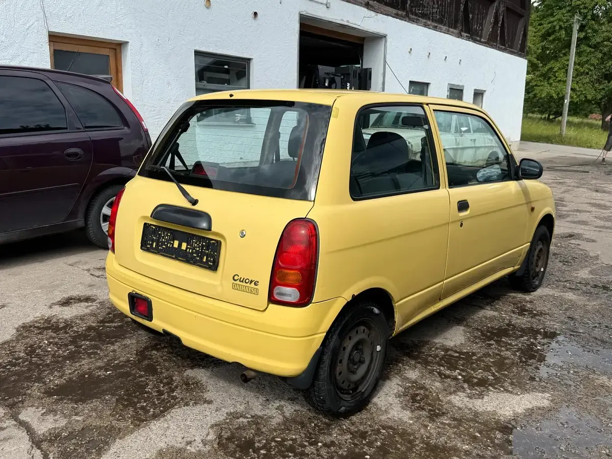 Gebraucht Daihatsu Cuore 56 PS (41 kW) 2000 Gelb Kleinwagen