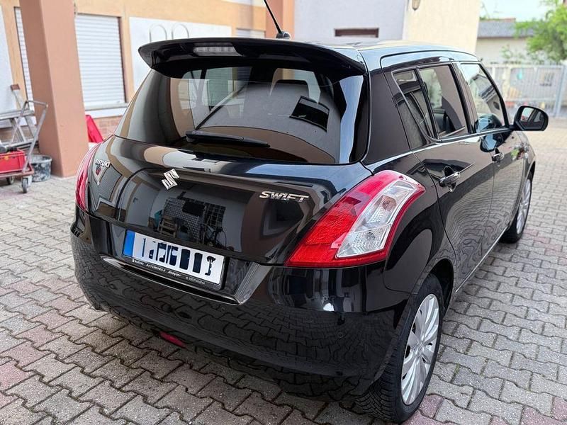 Gebraucht Suzuki Swift X-TRA 94 PS (69 kW) 2013 Schwarz Kleinwagen
