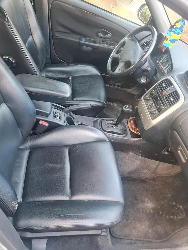 Gebraucht Mitsubishi Carisma 125 PS (91 kW) 2003 Silber Limousine