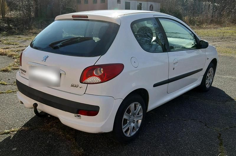 Gebraucht Peugeot 206+ 75 PS (55 kW) 2010 Weiß Kleinwagen