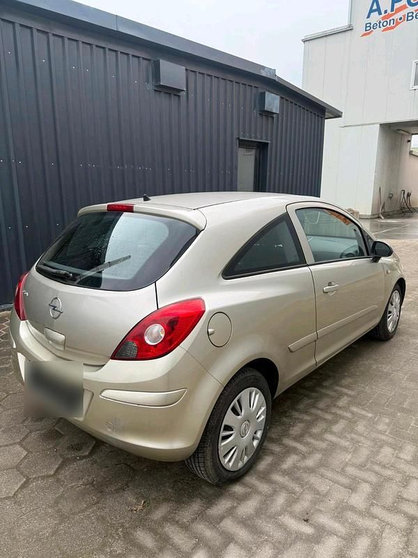 Second-hand Opel Corsa 60 CP (44 kW) 2006 Auriu Hatchback