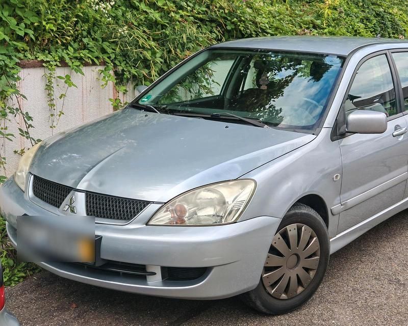Silber Gebraucht 2007 Mitsubishi Lancer Kombi | 350 € - Bild 1/4