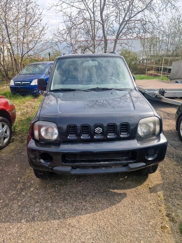Schwarz Gebraucht 1998 Suzuki Jimny SUV | 2.250 € (Fairer Preis) - Bild 1/4