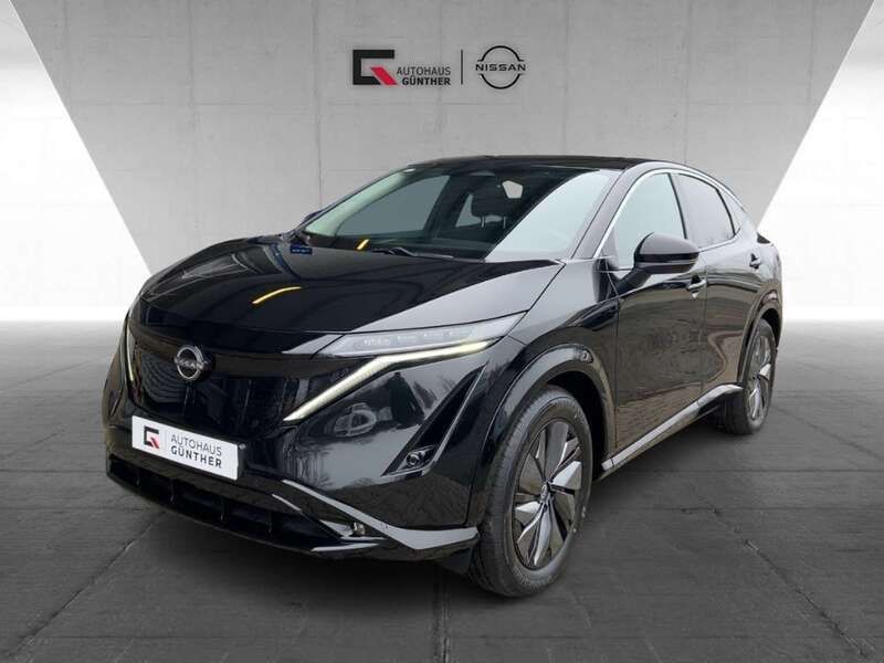 Schwarz (pearl black) Neu 2025 Nissan Ariya Advance SUV | 39.661 € (Fairer Preis) - Bild 1/4