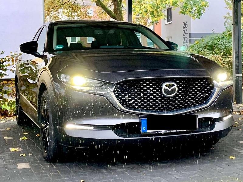 Grau Gebraucht 2023 Mazda CX-30 Homura-Line SUV | 25.600 € (Guter Preis) - Bild 1/4