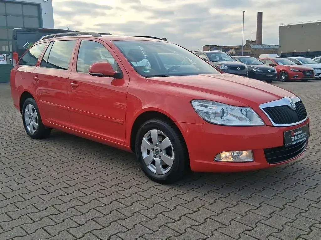 Gebraucht Skoda Octavia Ambition 105 PS (77 kW) 2013 Rot Kombi