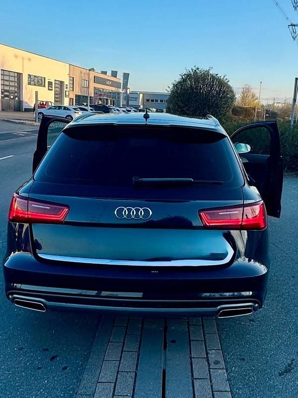 Second-hand Audi A6 S-Line 190 CP (139 kW) 2015 Albastru Break