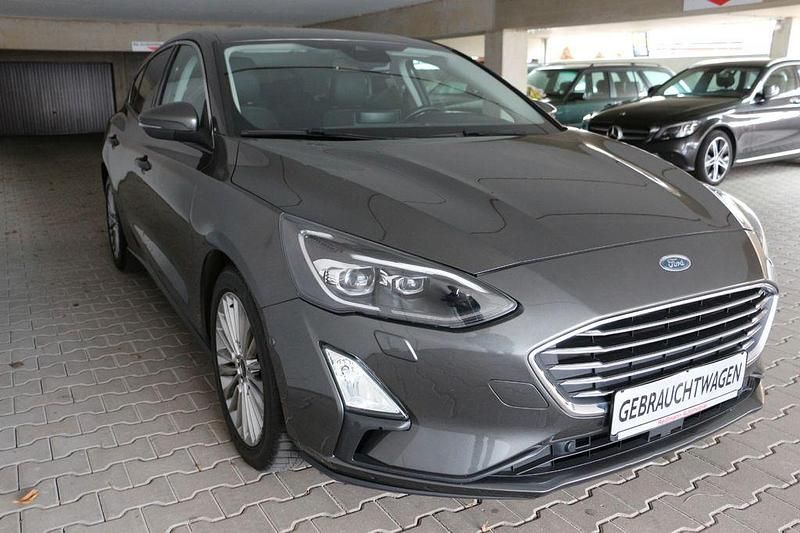 Gebraucht Ford Focus Titanium 125 PS (91 kW) 2019 Grau Limousine
