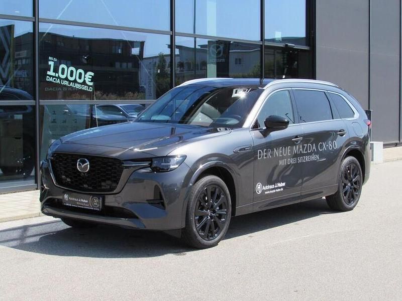 Grau Gebraucht 2024 Mazda CX-80 Homura-Line SUV | 54.990 € (Etwas zu teuer) - Bild 1/4