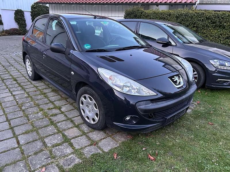 Gebraucht Peugeot 206+ 73 PS (53 kW) 2011 Grau Kleinwagen