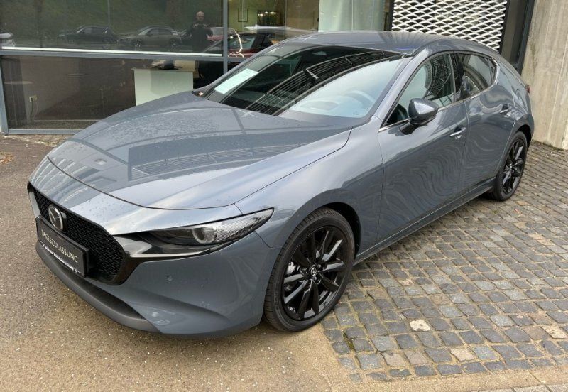 Andere farbe Gebraucht 2023 Mazda 3 Exclusive-Line Kleinwagen | 30.900 € (Etwas zu teuer) - Bild 1/4