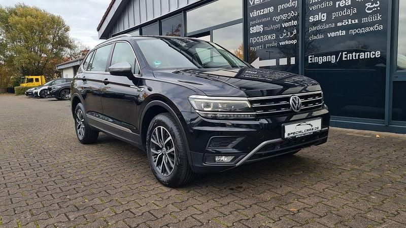 Schwarz Gebraucht 2018 VW Tiguan Allspace Comfortline SUV | 16.990 € (Teuer) - Bild 1/4