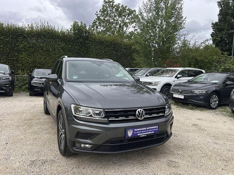 Grau Gebraucht 2020 VW Tiguan Active SUV | 22.299 € (Guter Preis) - Bild 1/4