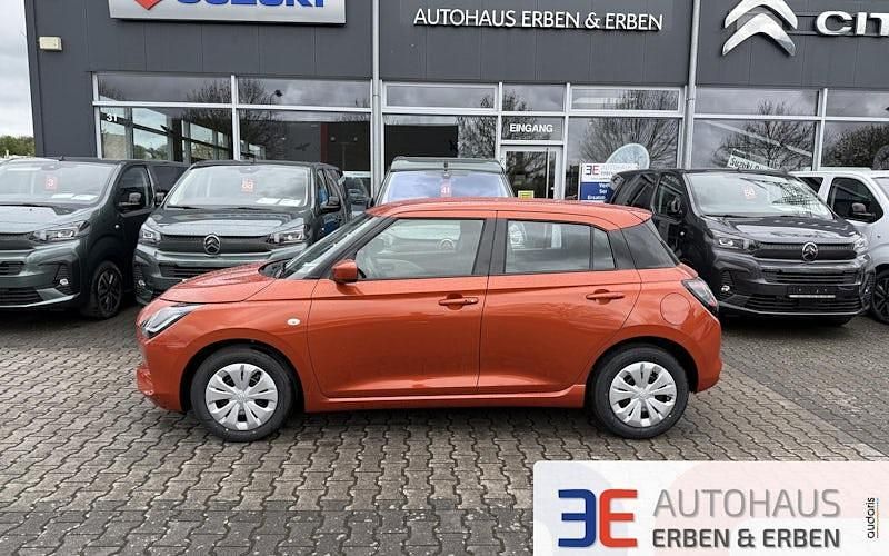 Orange Neu 2025 Suzuki Swift Club Limousine | 17.990 € - Bild 1/4