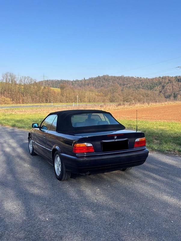 Gebraucht BMW 318 Cabriolet 115 PS (84 kW) 1997 Violet Cabrio