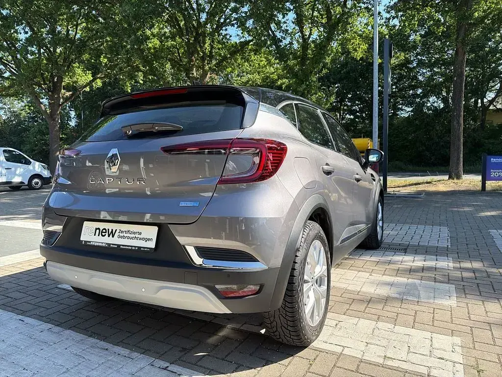 Gebraucht Renault Captur Intens 158 PS (116 kW) 2021 Stahlgrau mit dach in blackp SUV