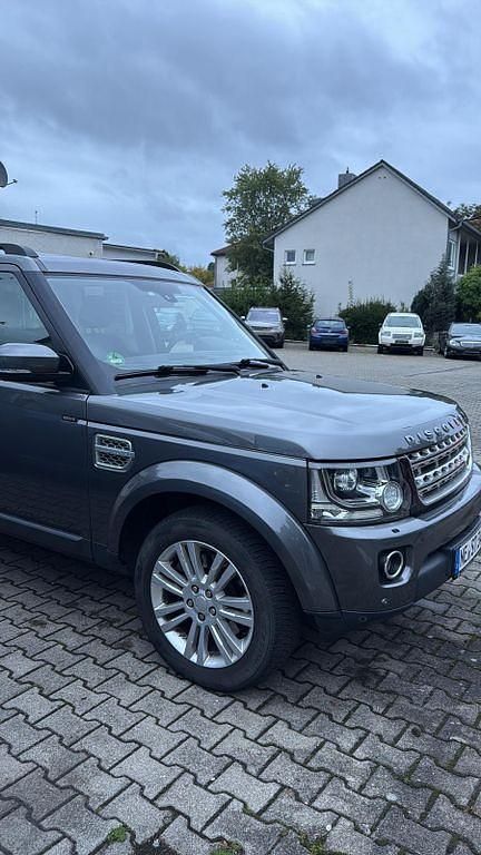 Grau Gebraucht 2016 Land Rover Discovery 4 SUV | 19.990 € (Superpreis) - Bild 1/4