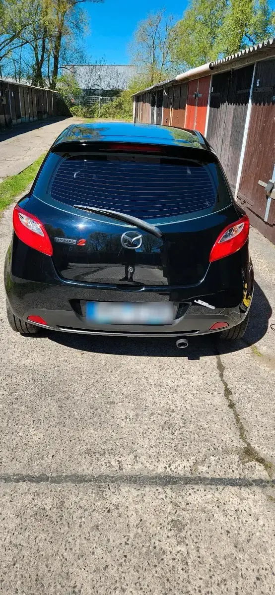 Używany Mazda 2 75 KM (55 kW) 2010 Czarny Hatchback