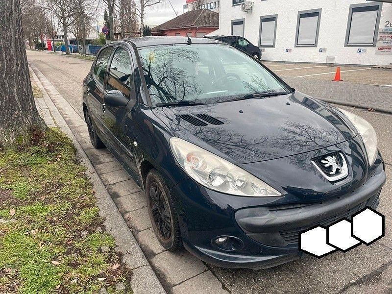 Gebraucht Peugeot 206+ 73 PS (53 kW) 2009 Grau Kleinwagen