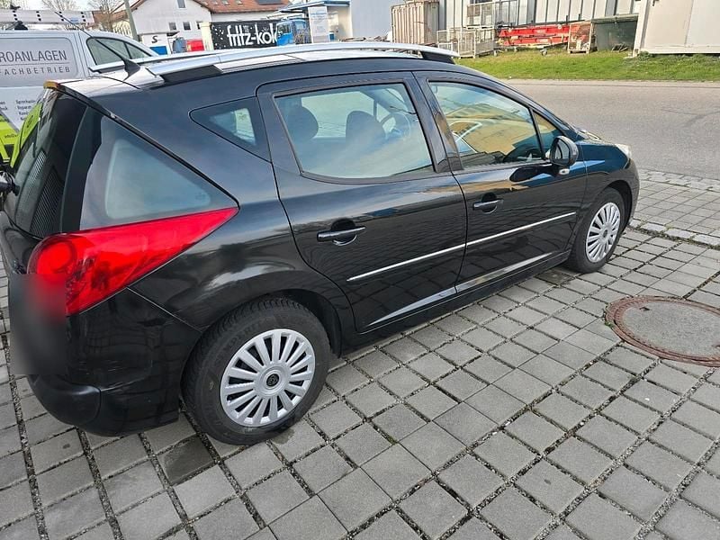 Gebraucht Peugeot 207 95 PS (69 kW) 2011 Schwarz Kombi
