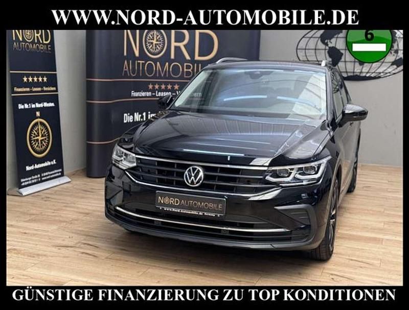 Deep black perleffek (metallic) Gebraucht 2021 VW Tiguan United SUV | 27.399 € (Fairer Preis) - Bild 1/3